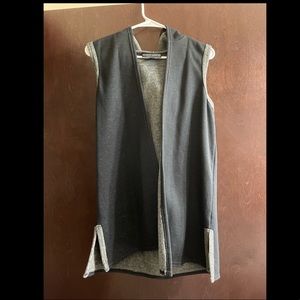 Almost Famous Size Small. Fuzzy on the inside very warm.